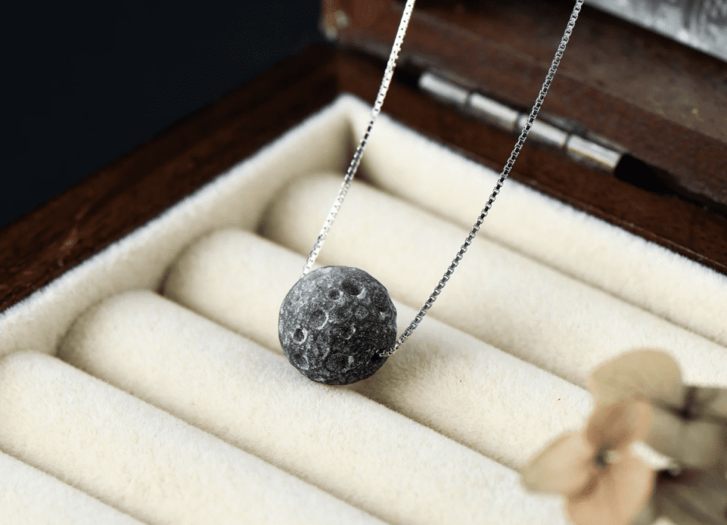 meteorite jewelry against jewelry holder